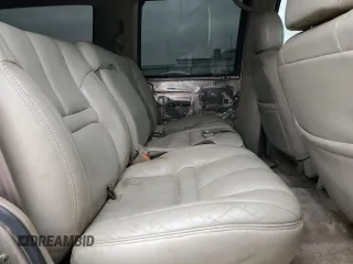 1999 Cadillac Escalade z VIN 1GYEK13R5XR415895, wystawiony jako Copart lot #87112044 z przebiegiem 141 662 mil mil oraz Tytuł czysty. Historia ofert i sprzedaży dostępna na DreamBid. Obrazek 11.