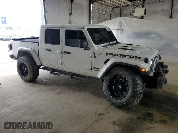 2020 Jeep Gladiator Rubicon z VIN 1C6JJTBG4LL102523, wystawiony jako Copart lot #54735955 z przebiegiem 104 579 mil mil oraz Szkoda całkowita • Salvage title. Historia ofert i sprzedaży dostępna na DreamBid. Obrazek 4.