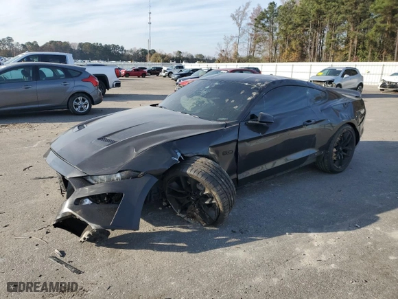 2022 Ford Mustang GT with VIN 1FA6P8CF9N5128418, listed as a Copart auction lot 82694214 with 0 mi miles and Salvage Title. Bid and sale history available at carsss.com. Image 1.