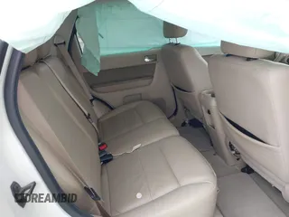 2010 Ford Escape Limited с VIN 1FMCU0EG1AKD30643, выставлен на аукционе IAAI как лот 42241302 с пробегом 180 142 миль миль и . История ставок и продаж доступна на DreamBid. Изображение 8.
