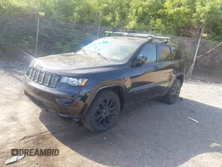 2018 Jeep Grand Cherokee Laredo E with VIN 1C4RJFAG2JC320441, listed as a IAAI auction lot 42095419 with 136,962 mi miles. Bid and sale history available at carsss.com. Image 17.