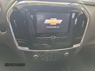 2020 Chevrolet Traverse with VIN 1GNERMKW4LJ167956, listed as a IAAI auction lot 42899082 with 130,713 mi miles and . Bid and sale history available at DreamBid. Image 7.