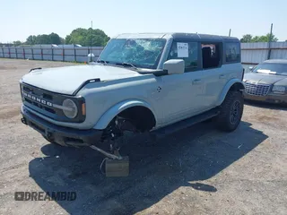 2022 Ford Bronco z VIN 1FMEE5DP3NLA80097, wystawiony jako IAAI lot #42461114 z przebiegiem 32 406 mil mil oraz . Historia ofert i sprzedaży dostępna na DreamBid. Obrazek 2.