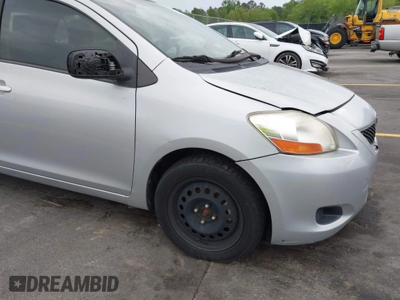 2009 Toyota Yaris with VIN JTDBT903394043218, listed as a IAAI auction lot 41974570 with 281,000 mi miles. Bid and sale history available at carsss.com. Image 12.