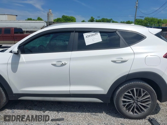 2019 Hyundai Tucson Sport with VIN KM8J33AL5KU066119, listed as a IAAI auction lot 42041651 with 60,281 mi miles. Bid and sale history available at carsss.com. Image 14.