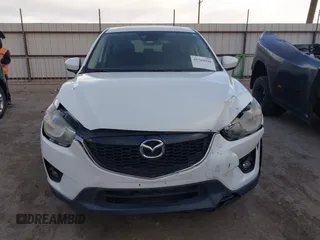 2014 Mazda CX-5 Touring with VIN JM3KE2CY8E0321578, listed as a IAAI auction lot 41769930 with 101,724 mi miles. Bid and sale history available at carsss.com. Image 12.