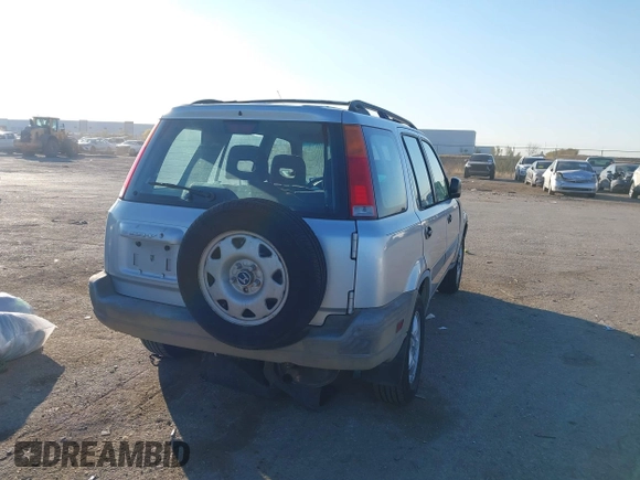 1999 Honda CR-V LX with VIN JHLRD284XXC019021, listed as a IAAI auction lot 41031098 with 204,206 mi miles. Bid and sale history available at carsss.com. Image 4.