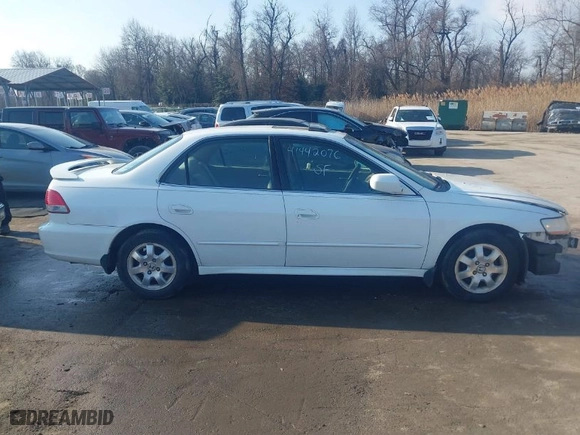 2002 Honda Accord Sdn EX with VIN 1HGCG56602A020944, listed as a IAAI auction lot 41442076 with 208,244 mi miles. Bid and sale history available at carsss.com. Image 13.