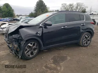 2020 Kia Sportage EX z VIN KNDPNCAC1L7779818, wystawiony jako Copart lot #51934025 z przebiegiem 77 170 mil mil oraz Szkoda całkowita • Salvage title. Historia ofert i sprzedaży dostępna na DreamBid. Obrazek 1.