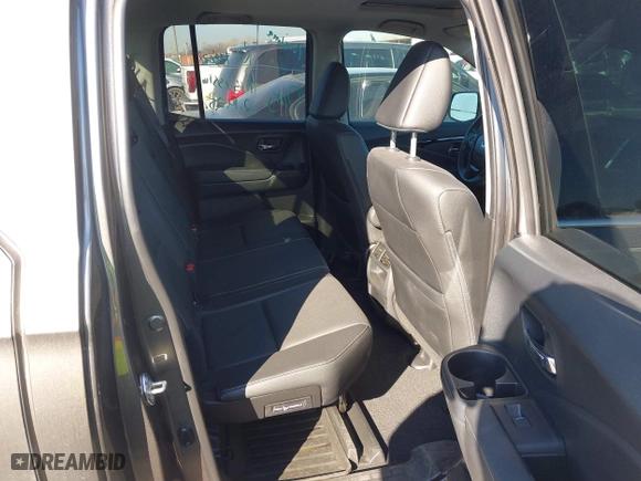 2020 Honda Ridgeline RTL-E with VIN 5FPYK3F72LB011694, listed as a IAAI auction lot 41628184 with 76,011 mi miles. Bid and sale history available at carsss.com. Image 8.