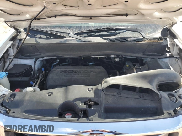 2015 Honda Pilot SE z VIN 5FNYF3H35FB006873, wystawiony jako Copart lot #51545275 z przebiegiem 150 500 mil mil oraz Szkoda całkowita • Salvage title. Historia ofert i sprzedaży dostępna na DreamBid. Obrazek 11.