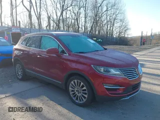 2015 Lincoln MKC with VIN 5LMTJ2AH0FUJ03004, listed as a IAAI auction lot 41997706 with 187,671 mi miles. Bid and sale history available at carsss.com. Image 1.
