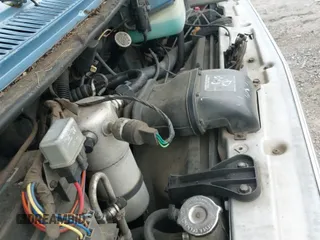 1990 Chevrolet Chevy Van z VIN 2GBEG25K0L4119444, wystawiony jako IAAI lot #42897765 z przebiegiem 138 034 mil mil oraz . Historia ofert i sprzedaży dostępna na DreamBid. Obrazek 19.