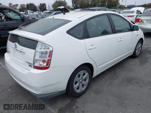 2007 Toyota Prius z VIN JTDKB20UX77550163, wystawiony jako IAAI lot #42379609 z przebiegiem 136 507 mil mil oraz . Historia ofert i sprzedaży dostępna na DreamBid. Obrazek 4.
