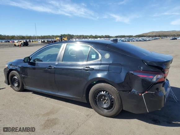 2021 Toyota Camry Hybrid LE with VIN 4T1C31AK7MU546556, listed as a Copart auction lot 45328755 with 135,524 mi miles and Salvage Title. Bid and sale history available at carsss.com. Image 2.