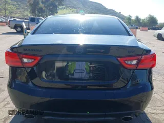 2018 Nissan Maxima S with VIN 1N4AA6AP9JC388366, listed as a IAAI auction lot 41842042 with 103,597 mi miles and . Bid and sale history available at DreamBid. Image 17.