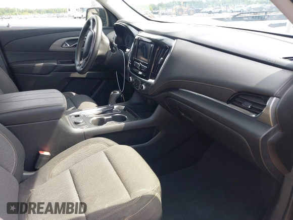 2020 Chevrolet Traverse LS with VIN 1GNERFKW1LJ189439, listed as a IAAI auction lot 42160909 with 102,583 mi miles and . Bid and sale history available at DreamBid. Image 5.