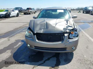 2005 Nissan Altima SE z VIN 1N4BL11D65C148642, wystawiony jako IAAI lot #42056330 z przebiegiem 81 328 mil mil oraz . Historia ofert i sprzedaży dostępna na DreamBid. Obrazek 12.