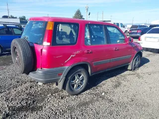 2000 Honda CR-V EX with VIN JHLRD1863YC051709, listed as a IAAI auction lot 41678500 with 197,313 mi miles. Bid and sale history available at carsss.com. Image 4.