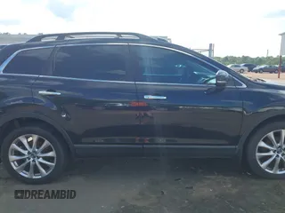 2015 Mazda CX-9 Grand Touring with VIN JM3TB2DA4F0464186, listed as a IAAI auction lot 42227595 with 124,526 mi miles and . Bid and sale history available at DreamBid. Image 13.