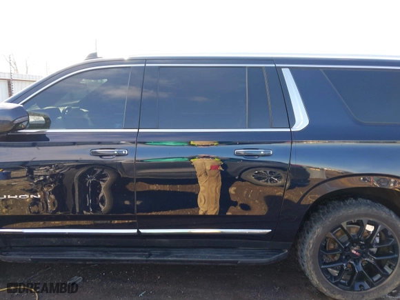 2022 GMC Yukon XL SLT with VIN 1GKS2GKDXNR134694, listed as a IAAI auction lot 41475723 with 52,579 mi miles. Bid and sale history available at carsss.com. Image 15.