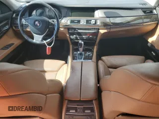 2012 BMW 7 Series with VIN WBAKX6C58CC197207, listed as a Copart auction lot 84153784 with 130,049 mi miles and Salvage title. Bid and sale history available at DreamBid. Image 8.
