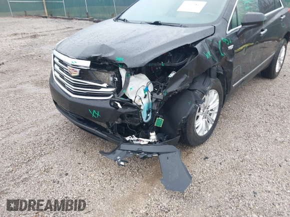 2018 Cadillac XT5 FWD with VIN 1GYKNARS6JZ160993, listed as a IAAI auction lot 41472847 with 113,415 mi miles. Bid and sale history available at carsss.com. Image 6.