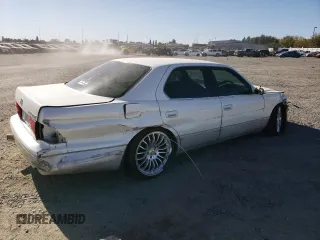 1995 Toyota Celica z VIN UCF210009608, wystawiony jako Copart lot #76088044 z przebiegiem 127 989 mil mil oraz Szkoda całkowita • Salvage title. Historia ofert i sprzedaży dostępna na DreamBid. Obrazek 3.