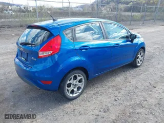 2011 Ford Fiesta SES with VIN 3FADP4FJ8BM119571, listed as a IAAI auction lot 41997018 with 108,487 mi miles. Bid and sale history available at carsss.com. Image 4.