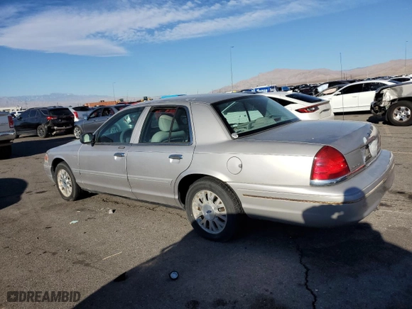 2005 Ford Crown Victoria LX with VIN 2FAFP74W75X165930, listed as a Copart auction lot 81641294 with 138,521 mi miles and Clean Title. Bid and sale history available at carsss.com. Image 2.