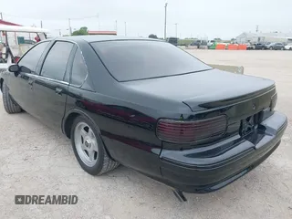 1994 Chevrolet Caprice LS z VIN 1G1BN52PXRR153486, wystawiony jako IAAI lot #42385035 z przebiegiem Nie podano mil oraz . Historia ofert i sprzedaży dostępna na DreamBid. Obrazek 3.