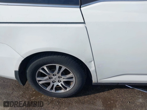 2011 Honda Odyssey EX-L with VIN 5FNRL5H6XBB059162, listed as a IAAI auction lot 42061378 with 164,317 mi miles and . Bid and sale history available at carsss.com. Image 18.