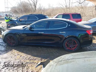 2014 Maserati Ghibli z VIN ZAM57XSA4E1090315, wystawiony jako IAAI lot #41423507 z przebiegiem 115 323 mil mil oraz . Historia ofert i sprzedaży dostępna na DreamBid. Obrazek 15.