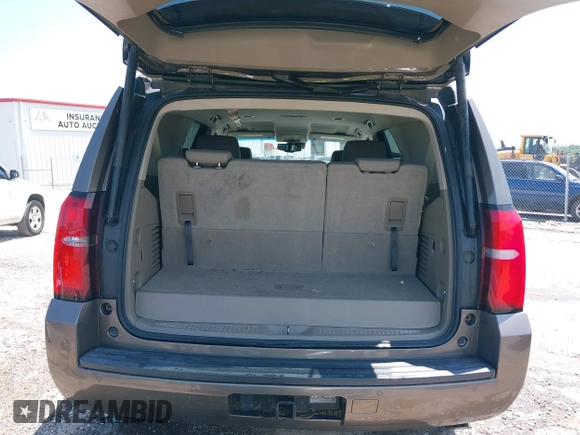 2016 Chevrolet Tahoe LT z VIN 1GNSCBKC8GR210829, wystawiony jako IAAI lot #42459936 z przebiegiem 160 518 mil mil oraz . Historia ofert i sprzedaży dostępna na DreamBid. Obrazek 18.