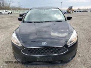 2018 Ford Focus SE with VIN 1FADP3F27JL301121, listed as a Copart auction lot 54596815 with 144,015 mi miles and Clean Title. Bid and sale history available at carsss.com. Image 5.