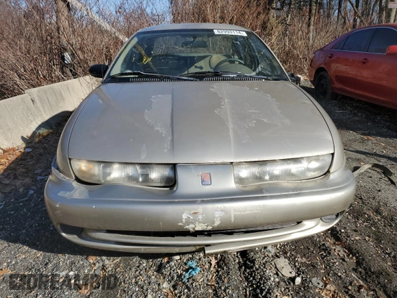 1998 Saturn SL z VIN 1G8ZK5275WZ210570, wystawiony jako Copart lot #82993114 z przebiegiem 144 690 mil mil oraz Szkody całkowita. Historia ofert i sprzedaży dostępna na DreamBid. Obrazek 5.