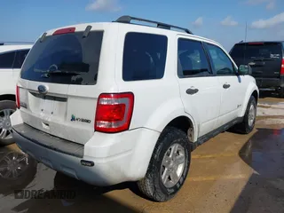 2011 Ford Escape Hybrid with VIN 1FMCU4K3XBKA75758, listed as a IAAI auction lot 42753145 with 170,554 mi miles and . Bid and sale history available at DreamBid. Image 4.