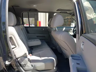2014 Honda Pilot EX-L with VIN 5FNYF3H78EB003547, listed as a IAAI auction lot 41857061 with 192,371 mi miles and . Bid and sale history available at carsss.com. Image 8.