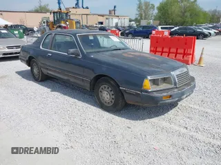 1984 Ford Thunderbird with VIN 1FABP46F1EH236498, listed as a IAAI auction lot 42025335 with 59,589 mi miles and . Bid and sale history available at DreamBid. Image 1.