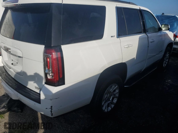 2019 GMC Yukon SLT with VIN 1GKS1BKC3KR243006, listed as a Copart auction lot 74732484 with 28,756 mi miles and Non Repairable. Bid and sale history available at DreamBid. Image 3.