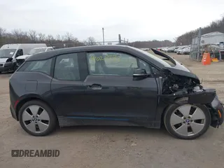 2015 BMW i3 z VIN WBY1Z4C5XFV501268, wystawiony jako IAAI lot #41028732 z przebiegiem 75 283 mil mil oraz . Historia ofert i sprzedaży dostępna na DreamBid. Obrazek 13.