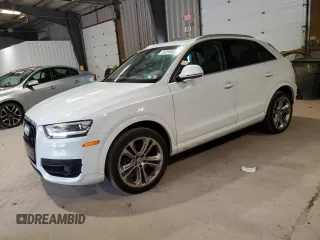 2015 Audi Q3 Prestige with VIN WA1GFCFS8FR012418, listed as a Copart auction lot 56099805 with 136,595 mi miles and Salvage title. Bid and sale history available at DreamBid. Image 1.