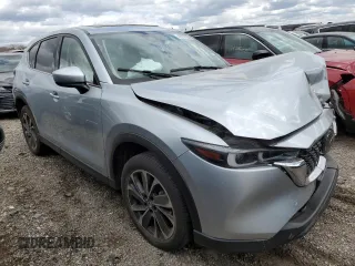 2023 Mazda CX-5 S Premium with VIN JM3KFBDM8P0203834, listed as a Copart auction lot 52496815 with 54,306 mi miles and Non Repairable. Bid and sale history available at DreamBid. Image 4.
