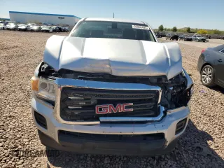 2016 GMC Canyon 2WD with VIN 1GTG5BEA1G1390236, listed as a Copart auction lot 50058495 with 143,316 mi miles and Salvage Title. Bid and sale history available at carsss.com. Image 5.