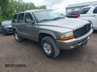 1999 Dodge Durango z VIN 1B4HS28Y2XF684492, wystawiony jako IAAI lot #42406259 z przebiegiem 241 447 mil mil oraz . Historia ofert i sprzedaży dostępna na DreamBid. Obrazek 1.