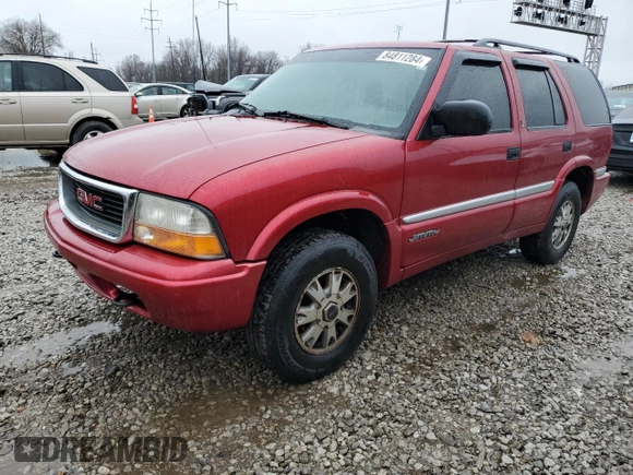2000 GMC Jimmy SLE Convenience z VIN 1GKDT13W0Y2273829, wystawiony jako Copart lot #84811284 z przebiegiem 129 635 mil mil oraz Szkoda całkowita • Salvage title. Historia ofert i sprzedaży dostępna na DreamBid. Obrazek 1.