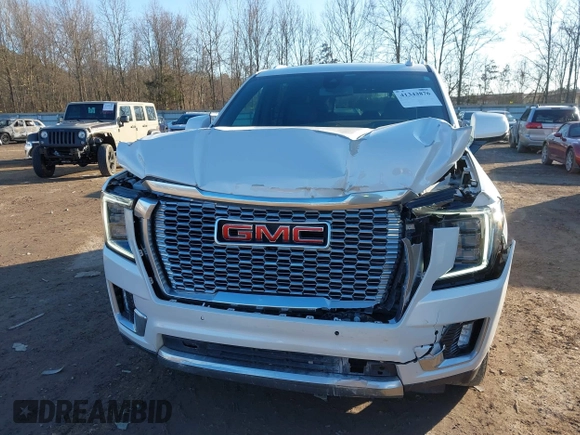 2021 GMC Yukon Denali with VIN 1GKS2DKL2MR458128, listed as a IAAI auction lot 41343876 with 64,732 mi miles. Bid and sale history available at carsss.com. Image 6.