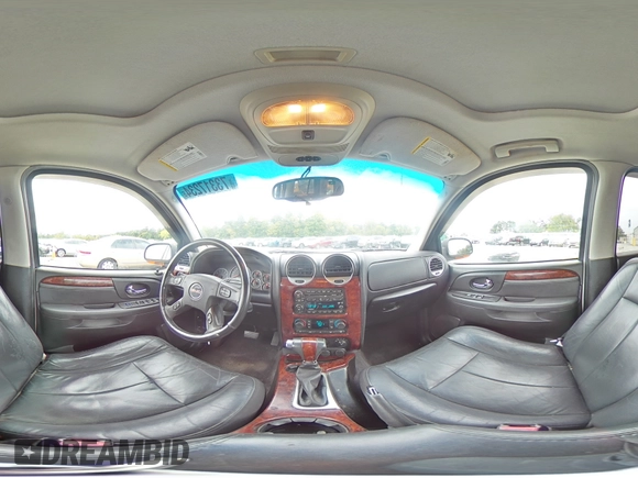 2005 GMC Envoy SLT with VIN 1GKDS13S652330496, listed as a Copart auction lot 73317234 with 191,138 mi miles and Salvage Title. Bid and sale history available at DreamBid. Image 14.