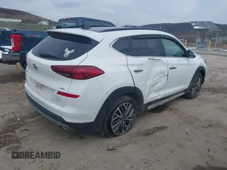 2019 Hyundai Tucson Ultimate with VIN KM8J3CALXKU016834, listed as a IAAI auction lot 40970606 with 104,208 mi miles. Bid and sale history available at carsss.com. Image 4.