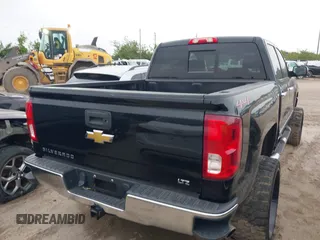 2018 Chevrolet Silverado 1500 LTZ with VIN 3GCUKSEC7JG357666, listed as a IAAI auction lot 42190446 with 100,326 mi miles. Bid and sale history available at carsss.com. Image 4.